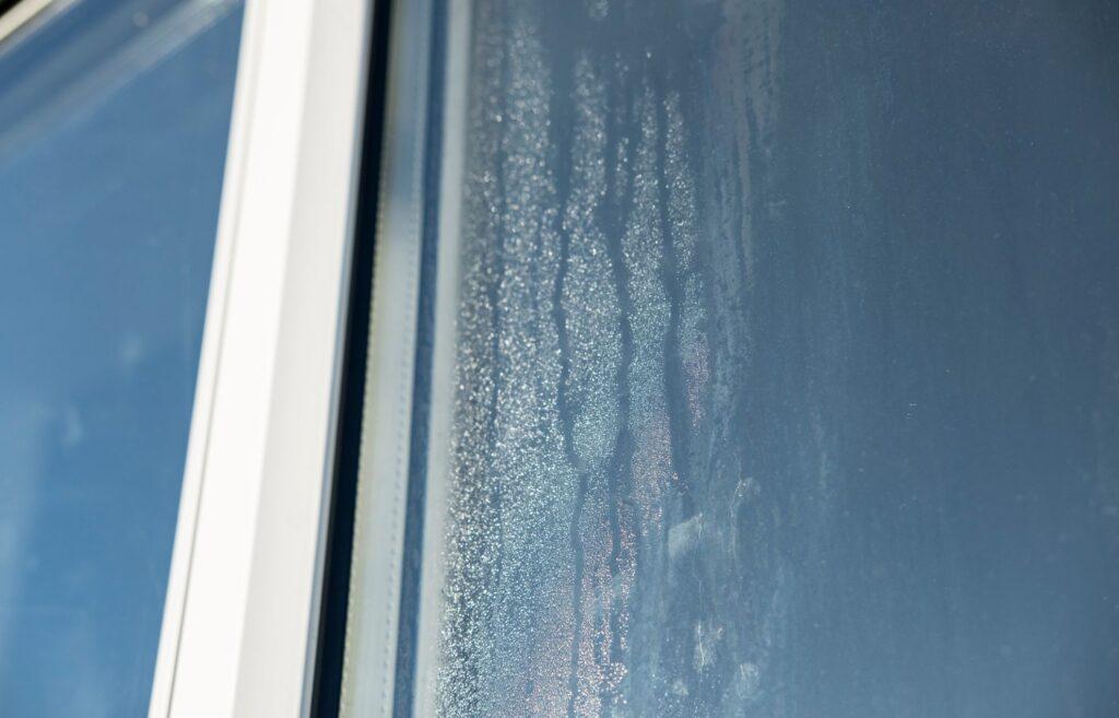 Window with blown window seals and condensation in panes