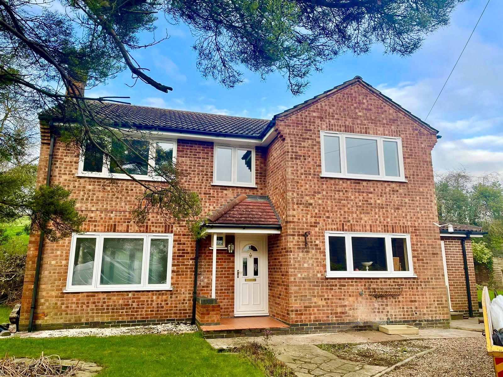 House in Leicester with uPVC wood grain windows