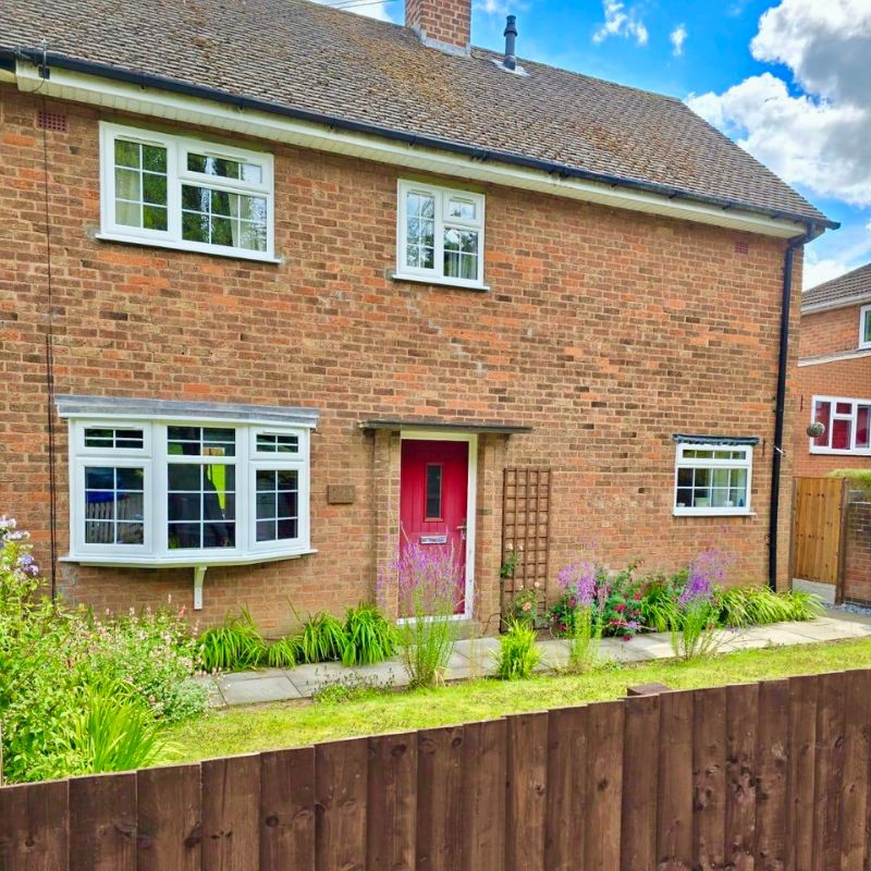 House with uPVC windows and Georgian bars