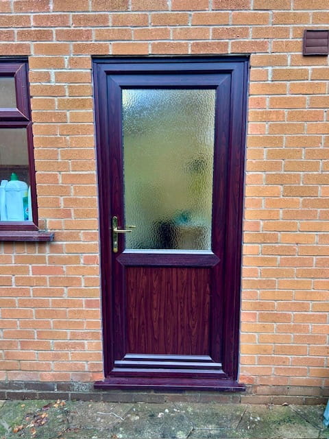 Rosewood uPVC back door replacement with half panel, half glass