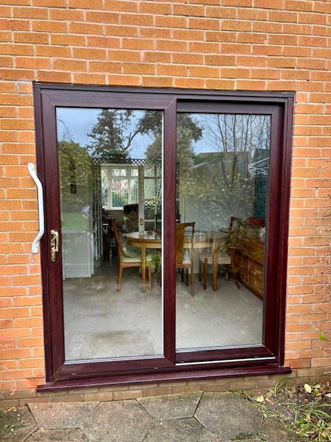 Rosewood uPVC sliding patio door installed in Leicestershire