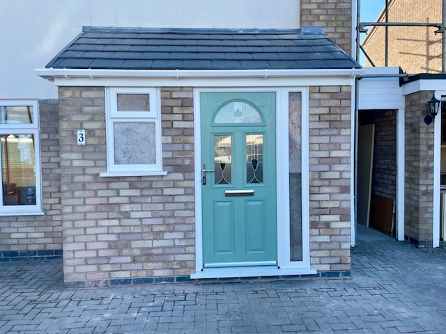 Brick porch renovation with Chartwell green door, side panel, uPVC window and tiled roof in Leicester