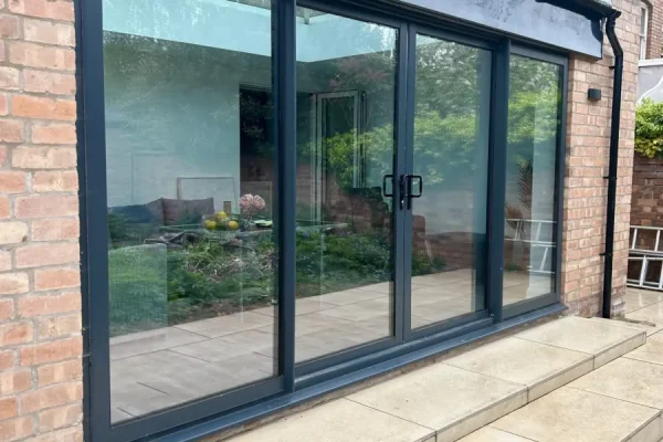 Anthracite-grey-aluminium-patio-doors-installation-scaled-1 Anthracite grey aluminium sliding patio doors