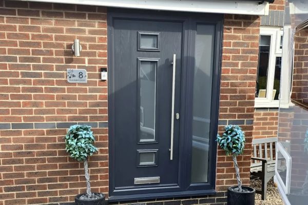 Anthracite grey composite door with a satin glass side panel Anthracite grey composite door with a satin glass side panel