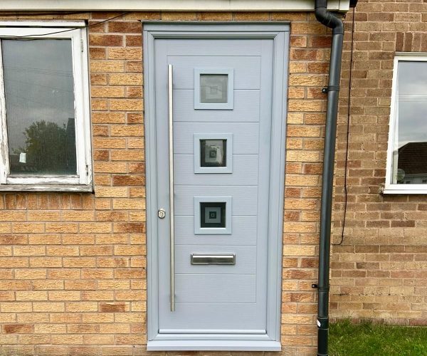 Grey composite door installation in Leicester