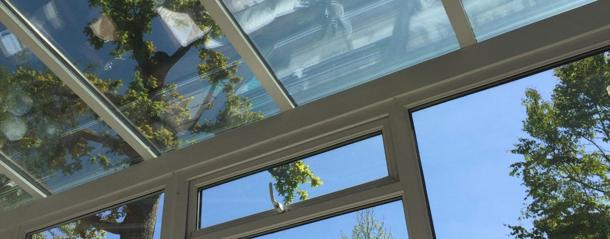 High performance energy efficient white uPVC windows in a double glazed conservatory - Phair Windows and Doors, Leicestershire