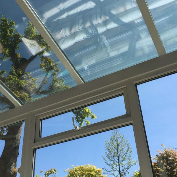 High performance energy efficient white uPVC windows in a double glazed conservatory - Phair Windows and Doors, Leicestershire