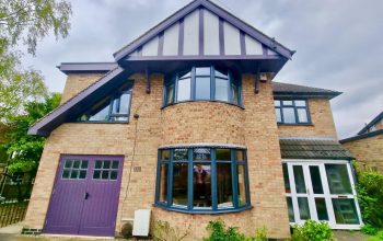 House with new anthracite grey aluminium windows installed by double glazing Leicester