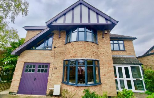 House with new anthracite grey aluminium windows installed by double glazing Leicester