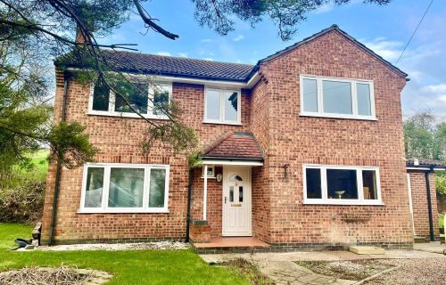 House with new white uPVC windows installed by double glazing Leicester company