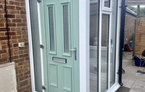 New porch with Chartwell green uPVC door New porch with Chartwell green uPVC door