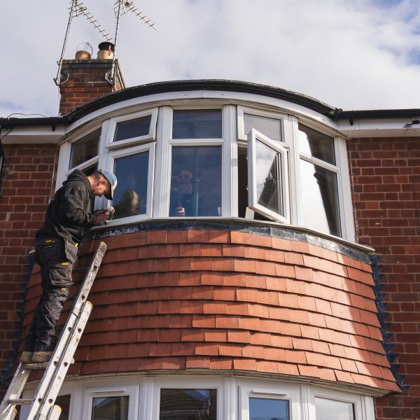 Phair Windows fitting team installing windows on terraced property