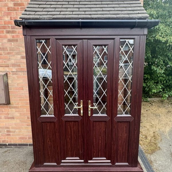 Porch replacement with uPVC windows in rosewood and diamond lead glass with matching French doors