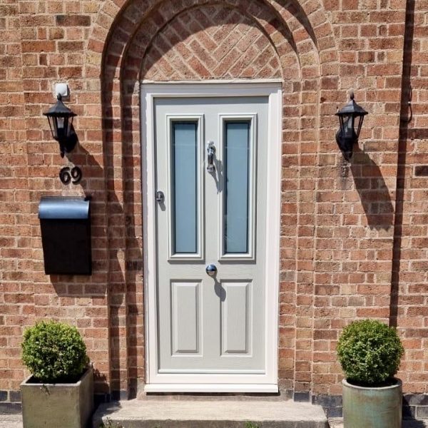 Solidor cream composite front door with satin panels