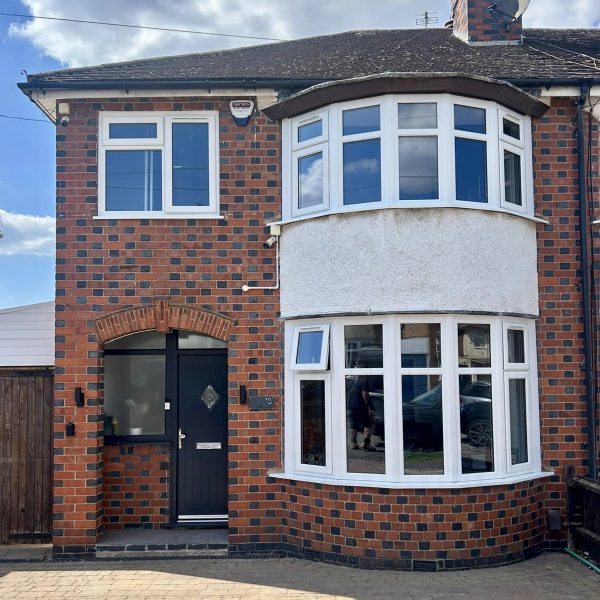 uPVC white bay installation in Leicestershire property