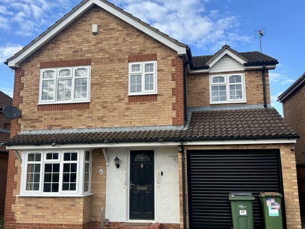 uPVC windows with Georgian bar and composite door installation
